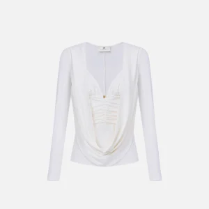 Maglia in jersey crêpe con logo gioiello