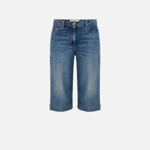 Jeans bermuda con zip