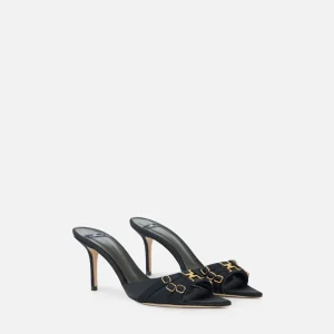 Mules in pelle con cinturini